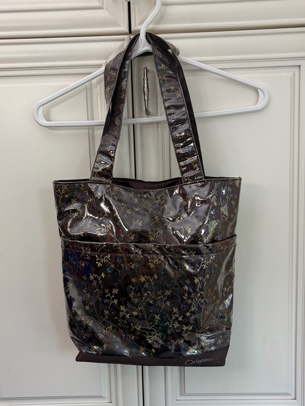 Floral diaper bag with internal diaper pouch